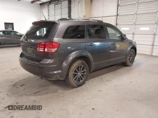 2017 Dodge Journey SE with VIN 3C4PDCAB2HT684231, listed as a IAAI auction lot 41189943 with 201,549 mi miles and . Bid and sale history available at DreamBid. Image 4.