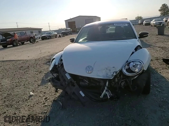 2016 Volkswagen Beetle Turbo R-Line with VIN 3VWVT7AT9GM602303, listed as a Copart auction lot 63845354 with 65,796 mi miles and Salvage Title. Bid and sale history available at DreamBid. Image 11.