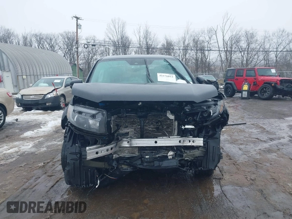 2021 Honda Ridgeline Sport with VIN 5FPYK3F12MB002877, listed as a IAAI auction lot 41576812 with 51,658 mi miles and . Bid and sale history available at DreamBid. Image 13.