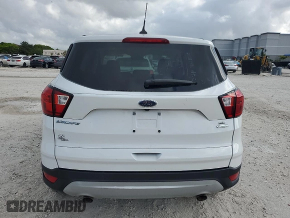 2019 Ford Escape SE z VIN 1FMCU0GD2KUB95892, wystawiony jako Copart lot #58071975 z przebiegiem Nie podano mil oraz Nie do naprawy • Non repairable. Historia ofert i sprzedaży dostępna na DreamBid. Obrazek 6.