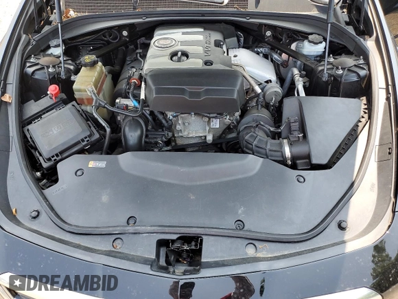 2014 Cadillac CTS Luxury AWD with VIN 1G6AX5SXXE0120681, listed as a Copart auction lot 60076655 with 99,552 mi miles and Salvage title. Bid and sale history available at DreamBid. Image 11.