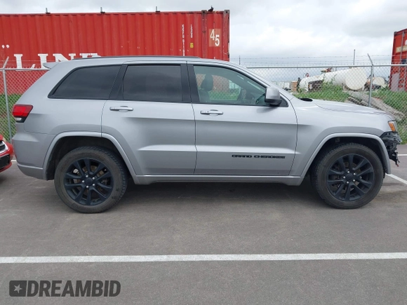 2017 Jeep Grand Cherokee Laredo with VIN 1C4RJFAG1HC701921, listed as a IAAI auction lot 42164963 with 135,039 mi miles and . Bid and sale history available at DreamBid. Image 14.