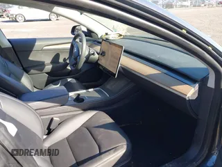 2022 Tesla Model 3 Long Range with VIN 5YJ3E1EB0NF365284, listed as a IAAI auction lot 41899706 with 36,463 mi miles and . Bid and sale history available at DreamBid. Image 5.