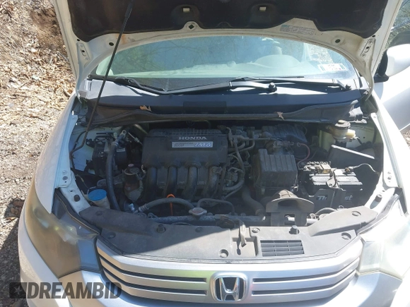 2011 Honda Insight with VIN JHMZE2H30BS012285, listed as a IAAI auction lot 42145139 with 161,672 mi miles and . Bid and sale history available at DreamBid. Image 10.