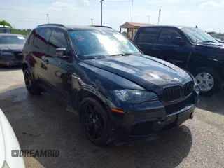 2011 BMW X5 M with VIN 5YMGY0C55BLK26414, listed as a IAAI auction lot 41907121 with 171,564 mi miles. Bid and sale history available at carsss.com. Image 1.