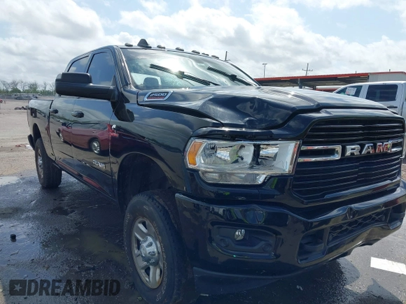 2020 Ram 2500 Big Horn with VIN 3C6UR5DL1LG197678, listed as a IAAI auction lot 41884565 with 128,728 mi miles. Bid and sale history available at carsss.com. Image 1.