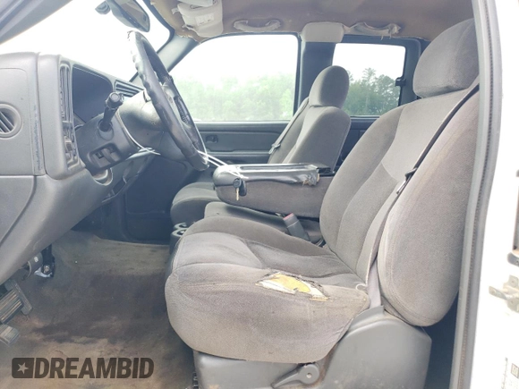 2004 GMC Sierra 1500 SLE with VIN 2GTEC19V941337956, listed as a Copart auction lot 54003035 with 233,059 mi miles and Salvage Title. Bid and sale history available at DreamBid. Image 7.