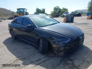 2023 Hyundai Sonata Limited with VIN KMHL34J28PA261498, listed as a IAAI auction lot 41598594 with 50,624 mi miles. Bid and sale history available at carsss.com. Image 1.