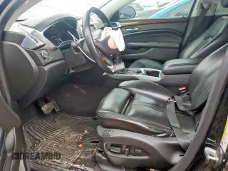 2013 Cadillac SRX Premium Collection с VIN 3GYFNJE39DS650569, выставлен на аукционе Copart как лот 59947905 с пробегом 146 548 миль миль и Списание • Salvage title. История ставок и продаж доступна на DreamBid. Изображение 7.