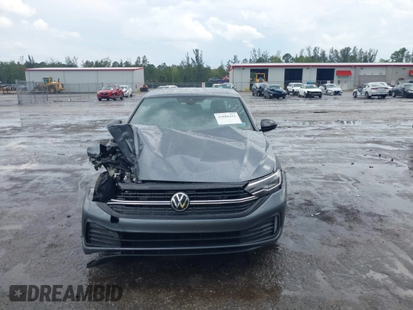 2023 Volkswagen Jetta Sport with VIN 3VWBM7BU8PM005151, listed as a IAAI auction lot 41886412 with 23,351 mi miles and . Bid and sale history available at DreamBid. Image 12.