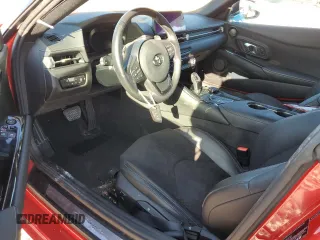 2021 Toyota GR Supra 2.0 with VIN WZ1DB2C0XMW043722, listed as a Copart auction lot 82909334 with 0 mi miles and Salvage Title. Bid and sale history available at carsss.com. Image 8.