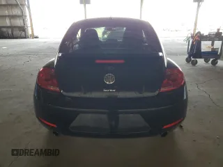 2012 Volkswagen Beetle 2.0T Turbo PZEV with VIN 3VW4A7AT3CM621473, listed as a Copart auction lot 47643595 with 32,840 mi miles and Salvage Title. Bid and sale history available at carsss.com. Image 6.