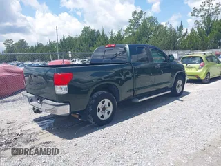 2010 Toyota Tundra z VIN 5TFRM5F19AX001732, wystawiony jako IAAI lot #42397135 z przebiegiem 191 780 mil mil oraz . Historia ofert i sprzedaży dostępna na DreamBid. Obrazek 4.