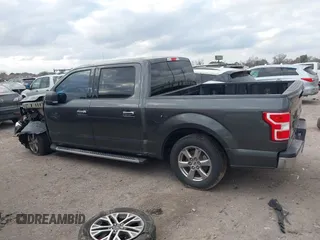 2019 Ford F-150 XL with VIN 1FTEW1CBXKKC92920, listed as a IAAI auction lot 41543793 with 147,986 mi miles and . Bid and sale history available at carsss.com. Image 14.