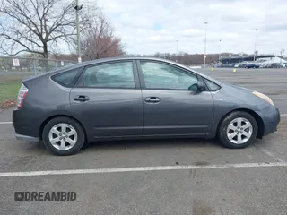 2007 Toyota Prius z VIN JTDKB20U073266399, wystawiony jako IAAI lot #41947176 z przebiegiem 186 258 mil mil oraz . Historia ofert i sprzedaży dostępna na DreamBid. Obrazek 13.