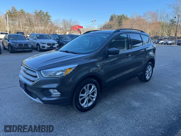 2018 Ford Escape SE with VIN 1FMCU9GD8JUA76991, listed as a Copart auction lot 52815245 with 213,827 mi miles and Clean Title. Bid and sale history available at carsss.com. Image 2.