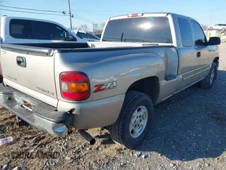 2003 Chevrolet Silverado 1500 with VIN 2GCEK19T531118735, listed as a IAAI auction lot 41706782 with 166,047 mi miles. Bid and sale history available at carsss.com. Image 4.