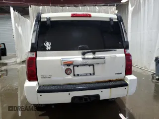 2010 Jeep Commander Limited z VIN 1J4RG5GTXAC109320, wystawiony jako Copart lot #70636104 z przebiegiem 160 011 mil mil oraz Szkoda całkowita • Salvage title. Historia ofert i sprzedaży dostępna na DreamBid. Obrazek 6.