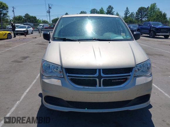 2015 Dodge Grand Caravan American Value with VIN 2C4RDGBG3FR647957, listed as a IAAI auction lot 42147813 with 129,859 mi miles and . Bid and sale history available at DreamBid. Image 6.
