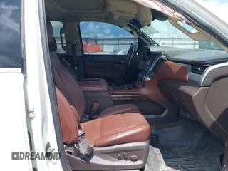 2018 Chevrolet Suburban Premier z VIN 1GNSKJKC6JR402075, wystawiony jako IAAI lot #42124796 z przebiegiem 156 900 mil mil oraz . Historia ofert i sprzedaży dostępna na DreamBid. Obrazek 5.