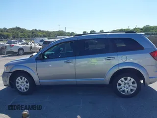 2018 Dodge Journey SE z VIN 3C4PDCAB8JT344720, wystawiony jako IAAI lot #40491703 z przebiegiem 86 601 mil mil oraz . Historia ofert i sprzedaży dostępna na DreamBid. Obrazek 14.