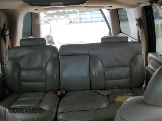 1999 GMC Yukon with VIN 1GKEK13R9XJ803351, listed as a Copart auction lot 81800974 with 0 mi miles and Salvage Title. Bid and sale history available at carsss.com. Image 10.
