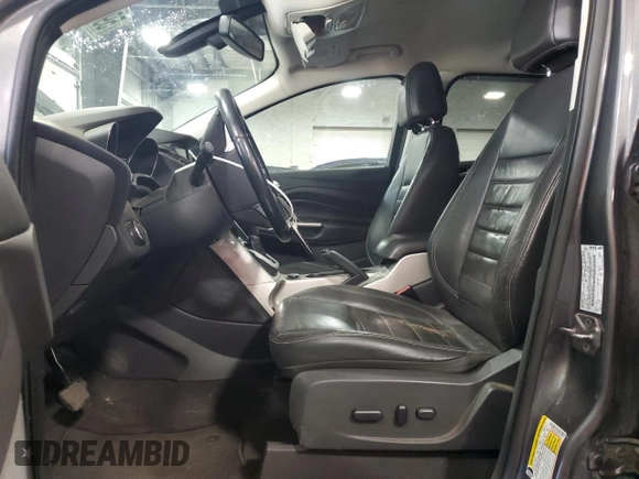 2013 Ford Escape SEL with VIN 1FMCU9HX8DUA34141, listed as a Copart auction lot 59681875 with 182,235 mi miles and Salvage title. Bid and sale history available at DreamBid. Image 7.