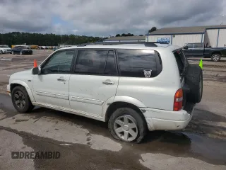 2002 Suzuki XL7 Standard z VIN JS3TY92V024106089, wystawiony jako Copart lot #58418685 z przebiegiem 232 254 mil mil oraz Szkoda całkowita • Salvage title. Historia ofert i sprzedaży dostępna na DreamBid. Obrazek 2.