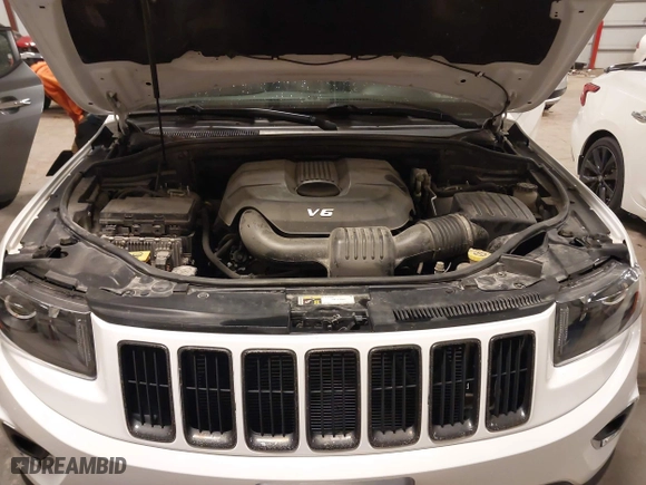 2015 Jeep Grand Cherokee Altitude with VIN 1C4RJFAG2FC905673, listed as a IAAI auction lot 41334271 with 160,531 mi miles. Bid and sale history available at carsss.com. Image 10.