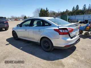 2013 Ford Focus Titanium with VIN 1FADP3J24DL327770, listed as a Copart auction lot 47582605 with 140,710 mi miles and Salvage Title. Bid and sale history available at carsss.com. Image 2.
