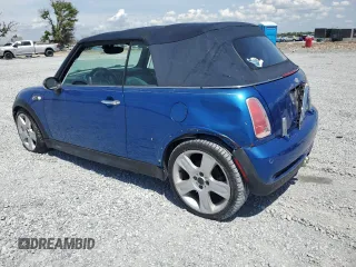 2006 MINI Convertible S with VIN WMWRH33566TK58973, listed as a Copart auction lot 51295575 with Not provided miles and Salvage title. Bid and sale history available at DreamBid. Image 2.