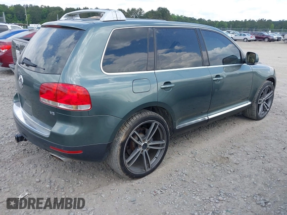 2004 Volkswagen Touareg z VIN WVGCM77L24D061029, wystawiony jako IAAI lot #42196634 z przebiegiem 221 240 mil mil oraz . Historia ofert i sprzedaży dostępna na DreamBid. Obrazek 4.