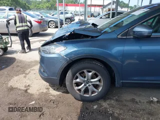 2014 Mazda CX-9 Touring with VIN JM3TB3CV7E0440747, listed as a IAAI auction lot 42457709 with 166,588 mi miles and . Bid and sale history available at DreamBid. Image 18.