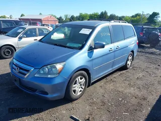 2007 Honda Odyssey EX-L with VIN 5FNRL38707B051950, listed as a IAAI auction lot 42175286 with 125,818 mi miles. Bid and sale history available at carsss.com. Image 2.