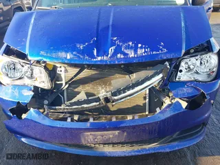 2018 Dodge Grand Caravan SE with VIN 2C4RDGBG8JR363409, listed as a IAAI auction lot 41129214 with 101,143 mi miles. Bid and sale history available at carsss.com. Image 6.
