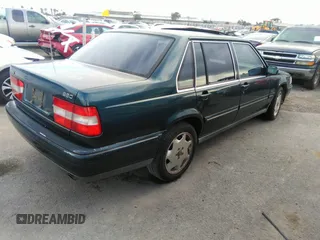 1997 Volvo S90 with VIN YV1KS9608V1107792, listed as a IAAI auction lot 38336416 with 146,975 mi miles. Bid and sale history available at carsss.com. Image 4.