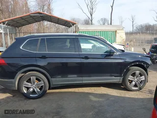 2020 Volkswagen Tiguan SE with VIN 3VV2B7AXXLM076870, listed as a IAAI auction lot 41811623 with 37,064 mi miles. Bid and sale history available at carsss.com. Image 14.
