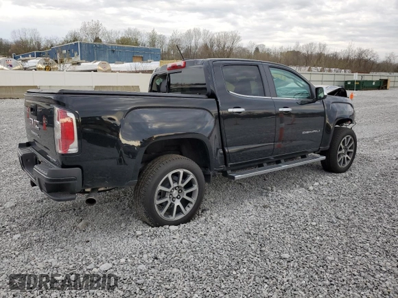 2021 GMC Canyon 4WD Denali z VIN 1GTG6EEN3M1101872, wystawiony jako Copart lot #53963085 z przebiegiem 72 791 mil mil oraz Szkoda całkowita • Salvage title. Historia ofert i sprzedaży dostępna na DreamBid. Obrazek 3.