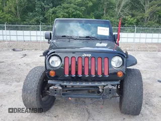 2012 Jeep Wrangler Unlimited Sahara with VIN 1C4HJWEG0CL168300, listed as a IAAI auction lot 42430678 with 70,000 mi miles and . Bid and sale history available at DreamBid. Image 6.