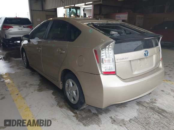 2011 Toyota Prius I with VIN JTDKN3DU2B1447144, listed as a IAAI auction lot 41887553 with 104,860 mi miles. Bid and sale history available at carsss.com. Image 3.