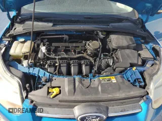 2013 Ford Focus SE z VIN 1FADP3F2XDL175079, wystawiony jako Copart lot #57408745 z przebiegiem 192 343 mil mil oraz Czysty tytuł • Clean title. Historia ofert i sprzedaży dostępna na DreamBid. Obrazek 11.