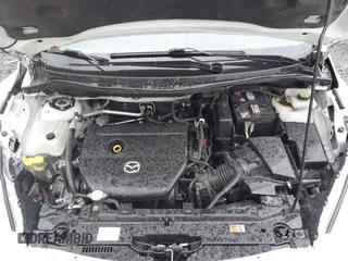 2015 Mazda Mazda5 Grand Touring with VIN JM1CW2DL6F0185594, listed as a IAAI auction lot 41470568 with 116,309 mi miles. Bid and sale history available at carsss.com. Image 10.
