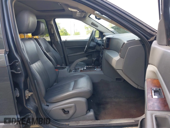 2007 Jeep Grand Cherokee Laredo z VIN 1J8HR48P57C590313, wystawiony jako IAAI lot #42306996 z przebiegiem 181 737 mil mil oraz . Historia ofert i sprzedaży dostępna na DreamBid. Obrazek 5.