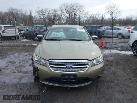 2012 Ford Taurus Limited z VIN 1FAHP2FW7CG128260, wystawiony jako IAAI lot #41640283 z przebiegiem 140 192 mil mil oraz . Historia ofert i sprzedaży dostępna na DreamBid. Obrazek 13.