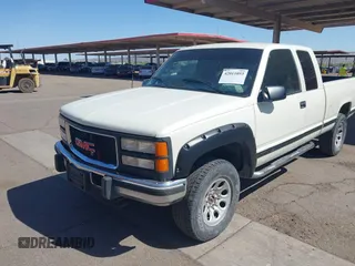 1995 GMC Sierra 1500 z VIN 2GTEK19K9S1591415, wystawiony jako IAAI lot #42011093 z przebiegiem 334 476 mil mil oraz . Historia ofert i sprzedaży dostępna na DreamBid. Obrazek 6.
