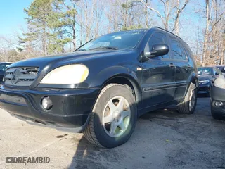 2001 Mercedes-Benz M-Class with VIN 4JGAB54E51A282080, listed as a IAAI auction lot 41437518 with 257,702 mi miles. Bid and sale history available at carsss.com. Image 2.