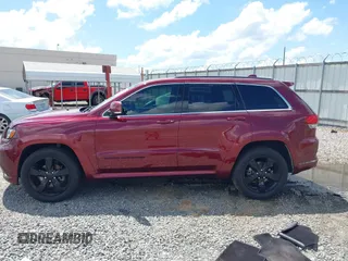 2016 Jeep Grand Cherokee Overland z VIN 1C4RJECG6GC401782, wystawiony jako IAAI lot #42442771 z przebiegiem 104 196 mil mil oraz . Historia ofert i sprzedaży dostępna na DreamBid. Obrazek 14.