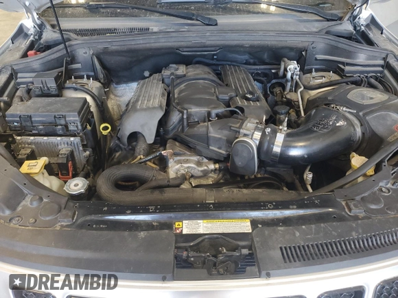 2012 Jeep Grand Cherokee SRT8 with VIN 1C4RJFDJ2CC105829, listed as a Copart auction lot 51840385 with 142,146 mi miles and Clean Title. Bid and sale history available at carsss.com. Image 12.