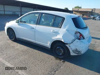 2009 Nissan Versa S with VIN 3N1BC13E99L436717, listed as a IAAI auction lot 42201306 with 51,460 mi miles and . Bid and sale history available at carsss.com. Image 3.