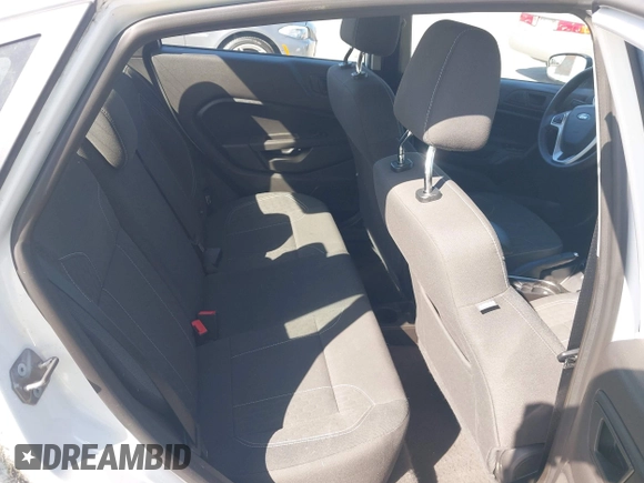 2019 Ford Fiesta SE z VIN 3FADP4BJ6KM143891, wystawiony jako IAAI lot #42244796 z przebiegiem 62 143 mil mil oraz . Historia ofert i sprzedaży dostępna na DreamBid. Obrazek 8.
